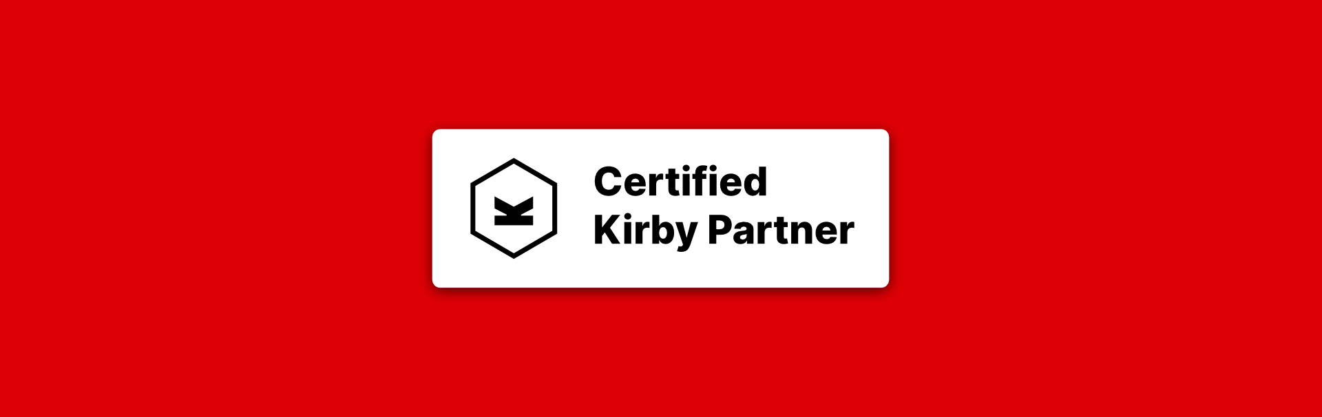 Weißes Rechteck mit schwarzem Kirby-Logo und dem Text Certified Kirby Partner vor rotem Hintergrund